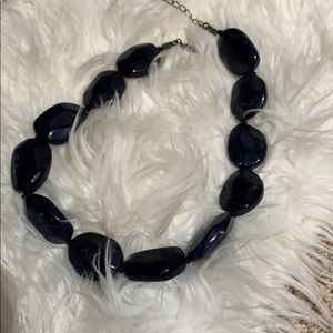 Navy blue stone choker necklace.